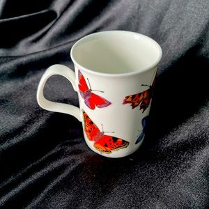 BUTTERFLY GARDEN MUG BY ROY KIRKHAM, 2008